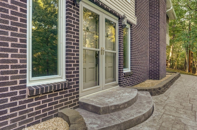 doorway to property with french doors