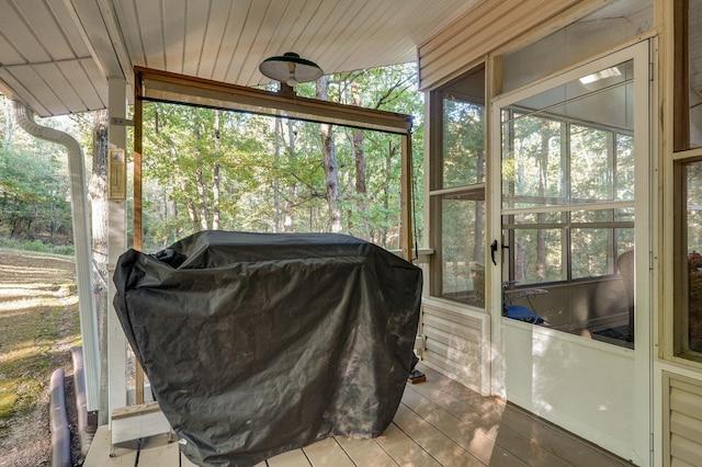 sunroom with wooden ceiling