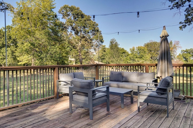 wooden terrace featuring an outdoor hangout area