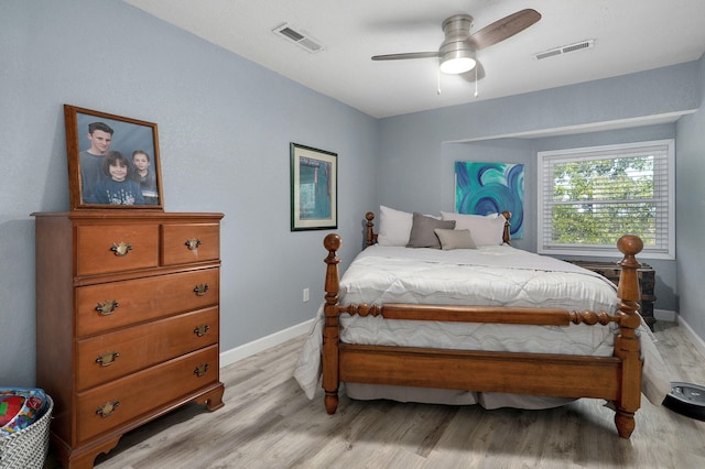 bedroom featuring ceiling fan and light hardwood / wood-style floors