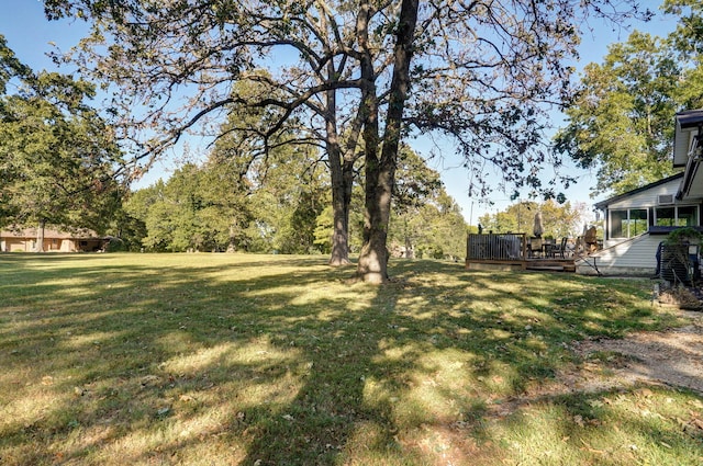 view of yard featuring a deck