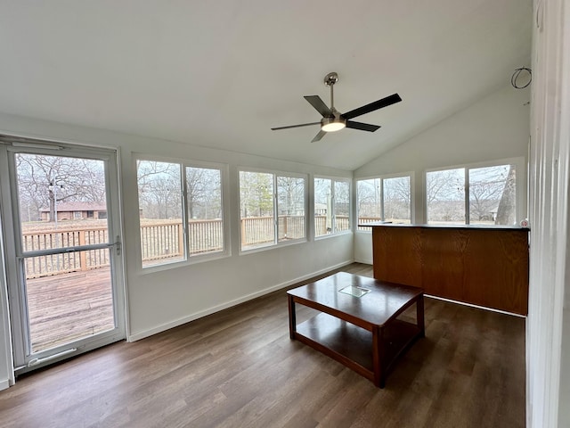 sunroom featuring vaulted ceiling and ceiling fan