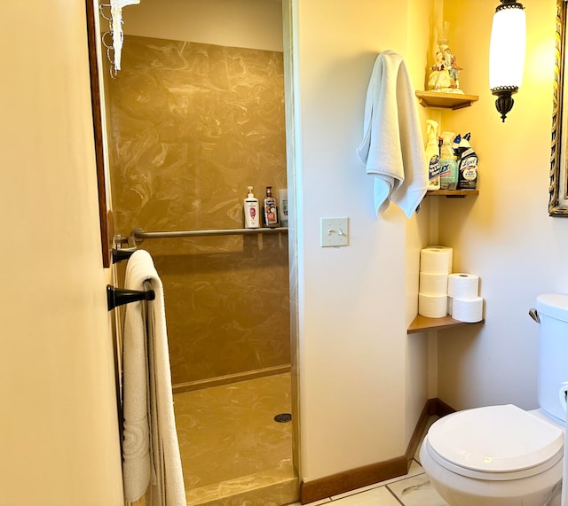 bathroom featuring tile patterned flooring and toilet