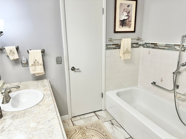 bathroom featuring vanity and a bathtub