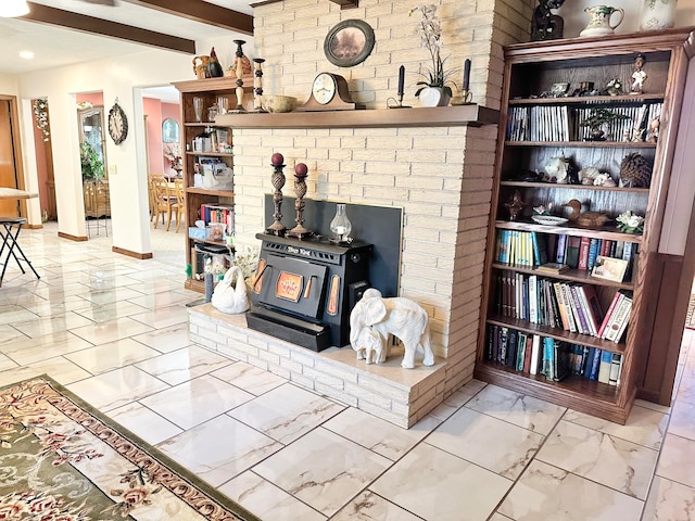 living room with beam ceiling