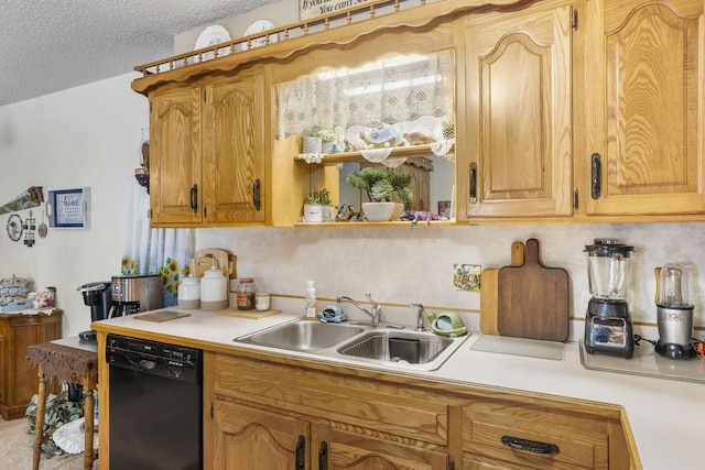 kitchen featuring dishwasher, backsplash, sink, and a textured ceiling