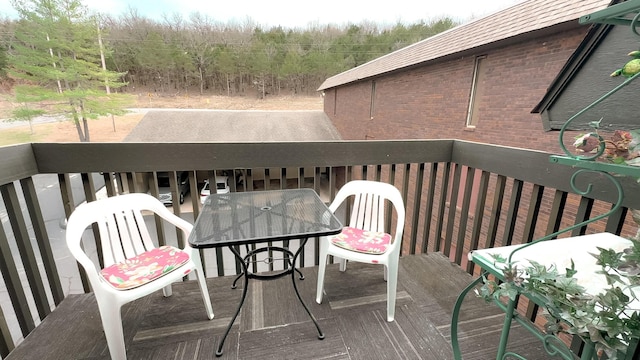 deck featuring outdoor dining area