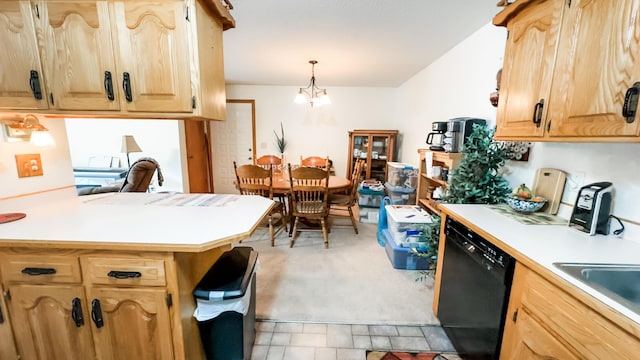 kitchen featuring a sink, light brown cabinetry, light carpet, light countertops, and black dishwasher