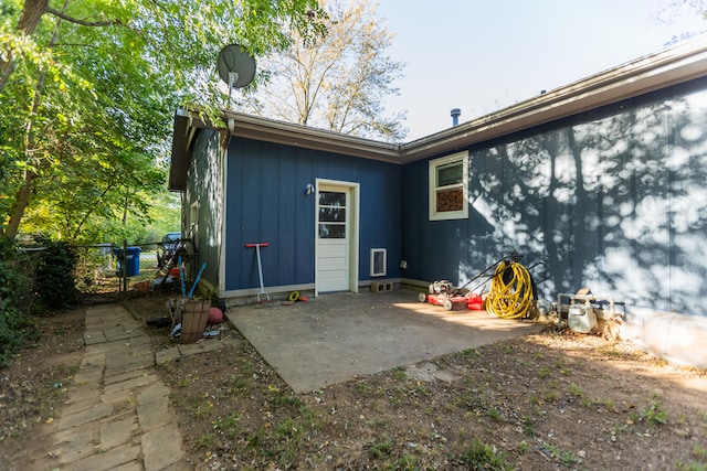 rear view of house featuring a patio