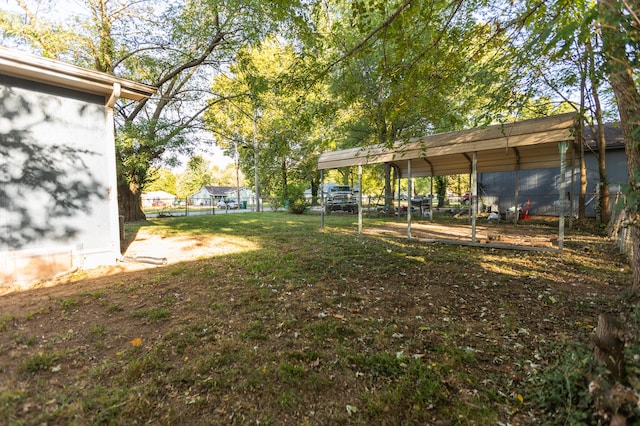 view of yard featuring a carport