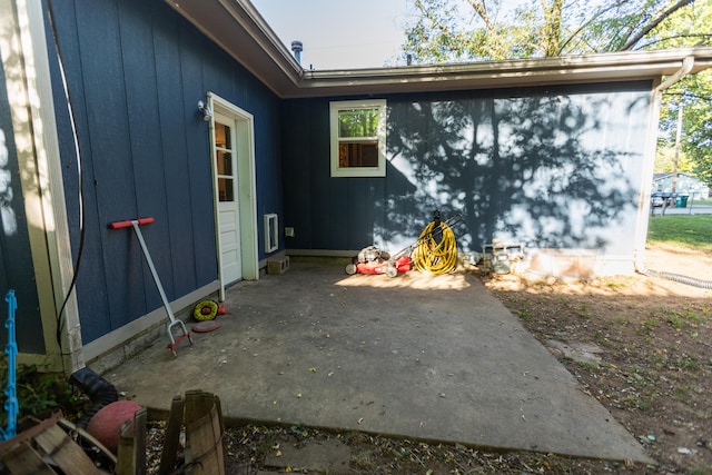 view of side of home featuring a patio area