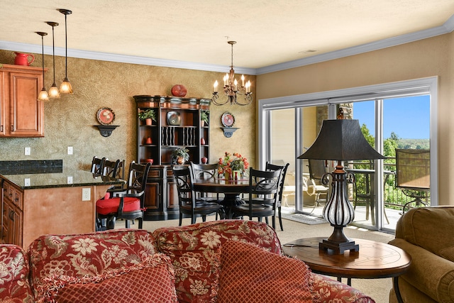 dining room with crown molding, a notable chandelier, and light carpet