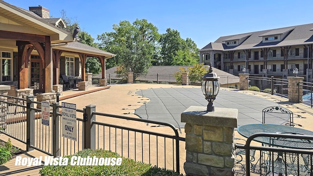 view of patio / terrace featuring a community pool