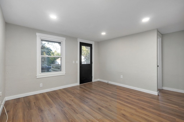 foyer entrance featuring dark hardwood / wood-style flooring