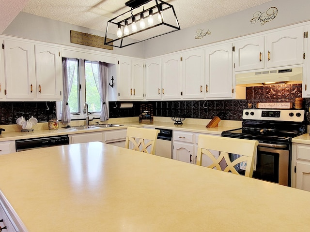 kitchen with appliances with stainless steel finishes, sink, a textured ceiling, white cabinetry, and custom range hood