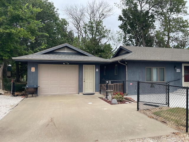 single story home with a garage