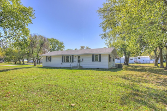 ranch-style house with a front yard