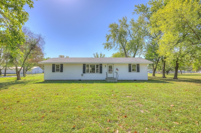 ranch-style house with a front lawn