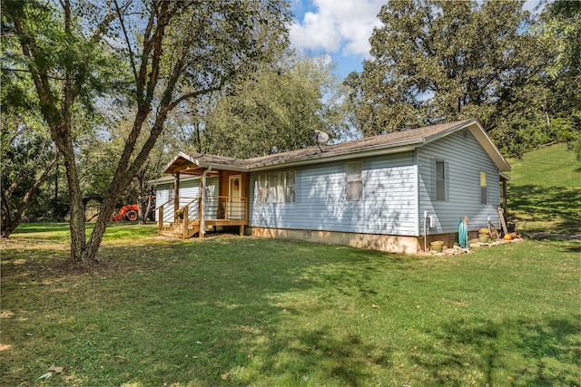 view of front of property with a front lawn