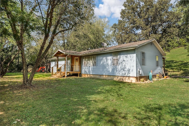 exterior space featuring a front lawn