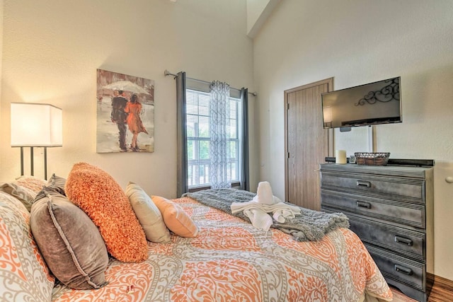 bedroom with wood-type flooring