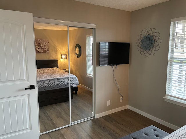 16 Fall Creek Trl Unit 2, Branson, MO 65616 - bedroom with wood finished floors and a closet