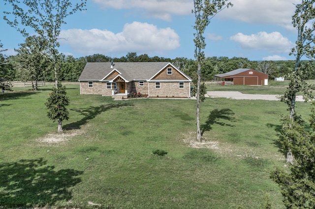 view of front of home with a front lawn