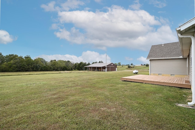 view of yard with a wooden deck