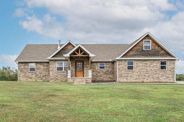 craftsman-style house with a front yard