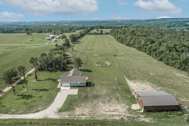 birds eye view of property featuring a rural view