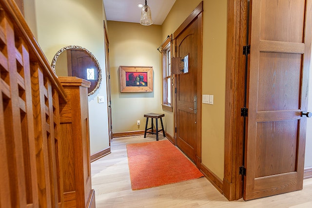 corridor featuring light hardwood / wood-style flooring