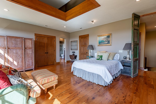 bedroom featuring hardwood / wood-style flooring