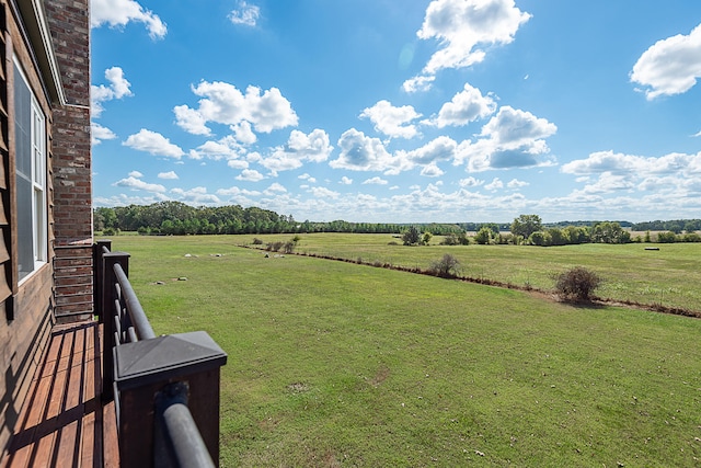 view of yard with a rural view