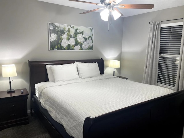 bedroom featuring ceiling fan and carpet floors