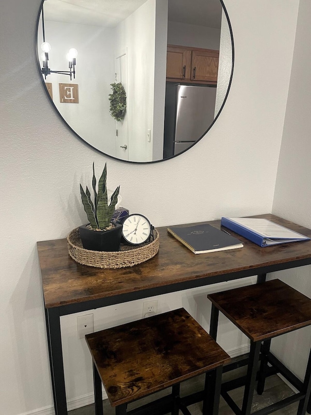 room details featuring stainless steel refrigerator