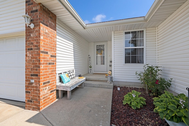 property entrance with a garage