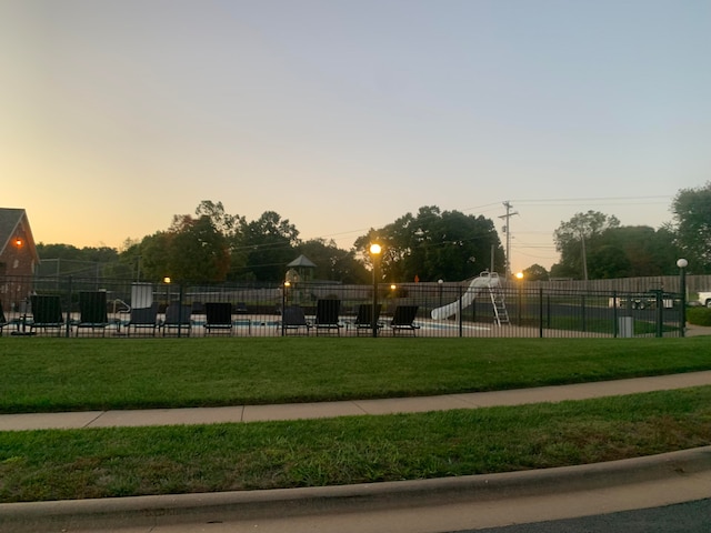 view of home's community featuring a yard