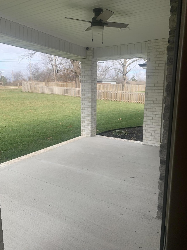 view of patio featuring ceiling fan