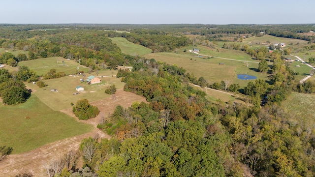 birds eye view of property featuring a rural view