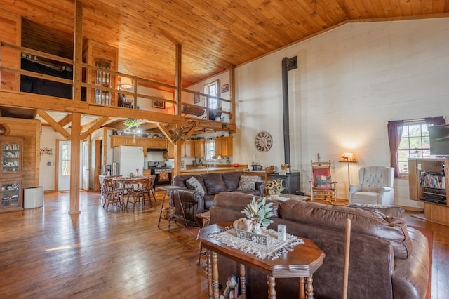 living room featuring decorative columns, high vaulted ceiling, wooden ceiling, and wood-type flooring