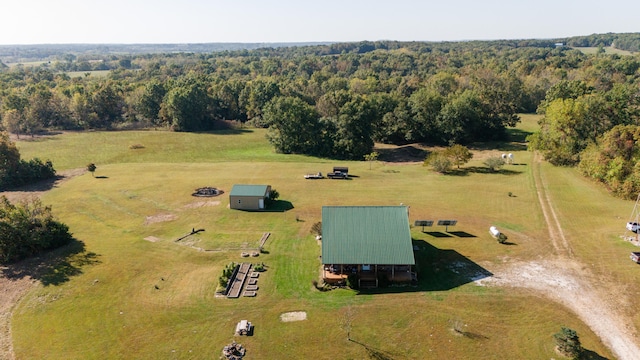 birds eye view of property featuring a rural view