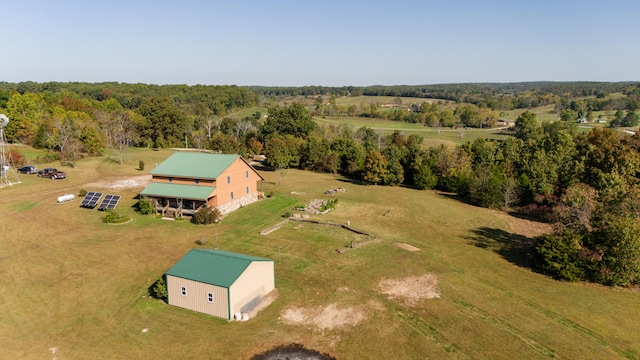 birds eye view of property featuring a rural view