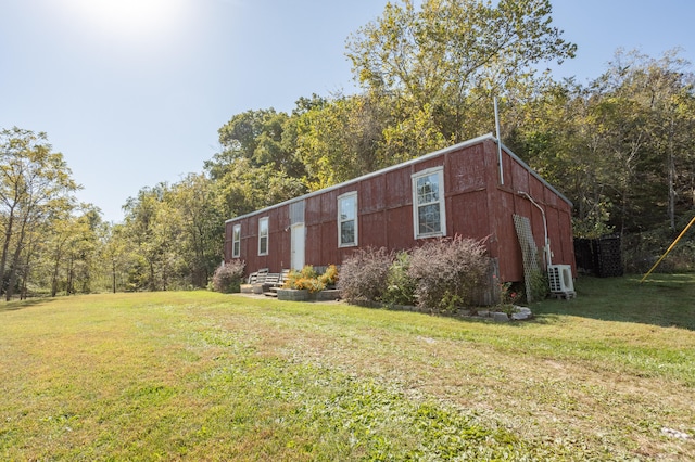 view of home's exterior featuring a yard