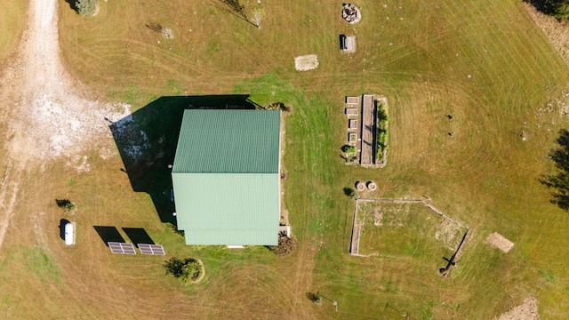 birds eye view of property featuring a rural view