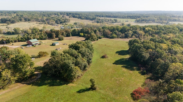 birds eye view of property featuring a rural view