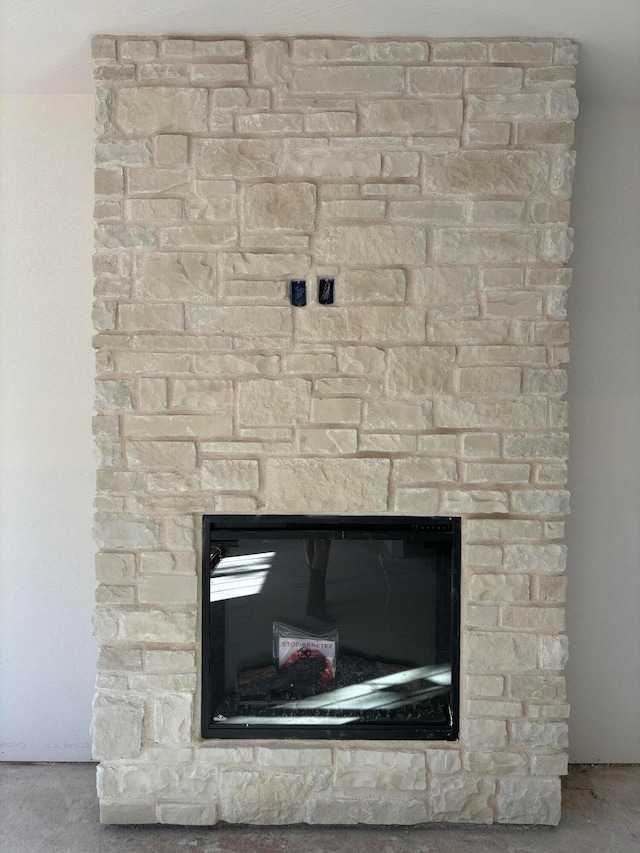 details featuring a stone fireplace