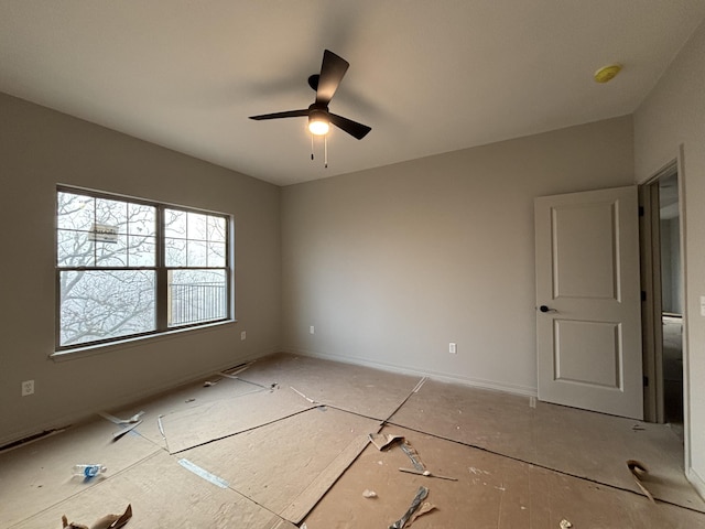 empty room featuring ceiling fan