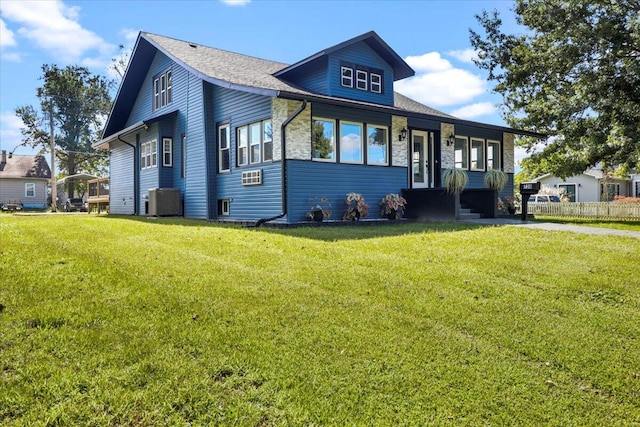 view of front of property with a front lawn