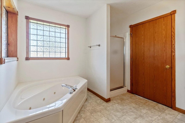 bathroom with independent shower and bath