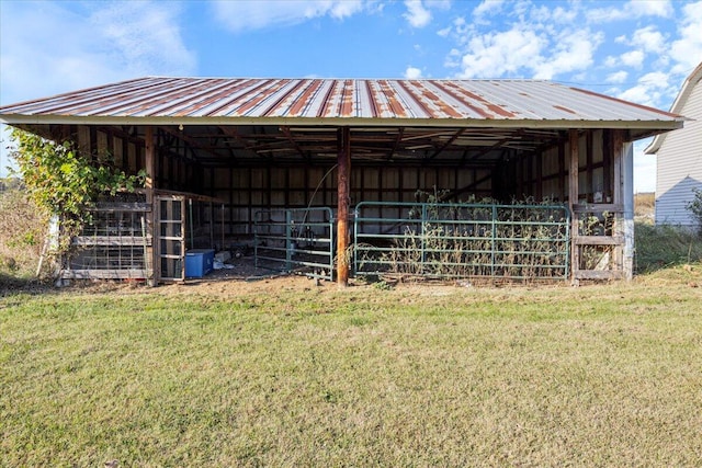 view of outdoor structure featuring a yard